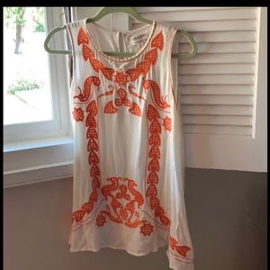 Beautifully embroidered orange and cream blouse